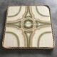 Ceramic tile trivet with vintage pattern woven wicker outline