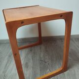Sled-shaped side table