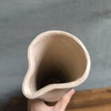 Pichet carafe in unglazed stoneware with a leaf pattern, stamped with the manufacturer's mark.