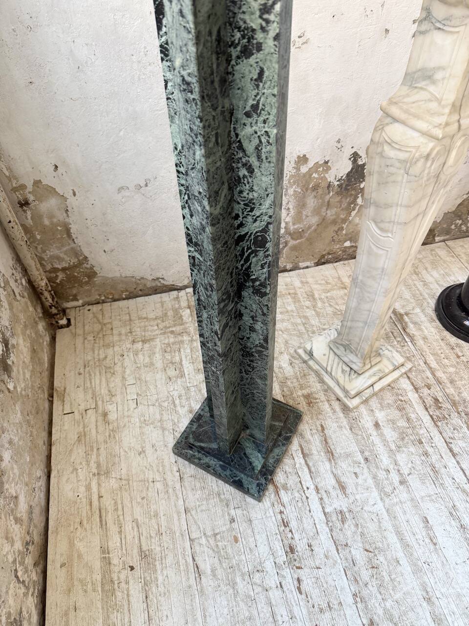 Set of 4 marble columns or pedestals.