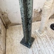 Set of 4 marble columns or pedestals.