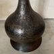 Hammered metal vase