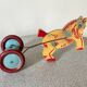 Vintage pull-along toy, horse-drawn with a bell, musical toy