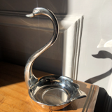 Empty silver swan pocket