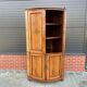Louis Seize Oak corner cabinet with a quarter curved front