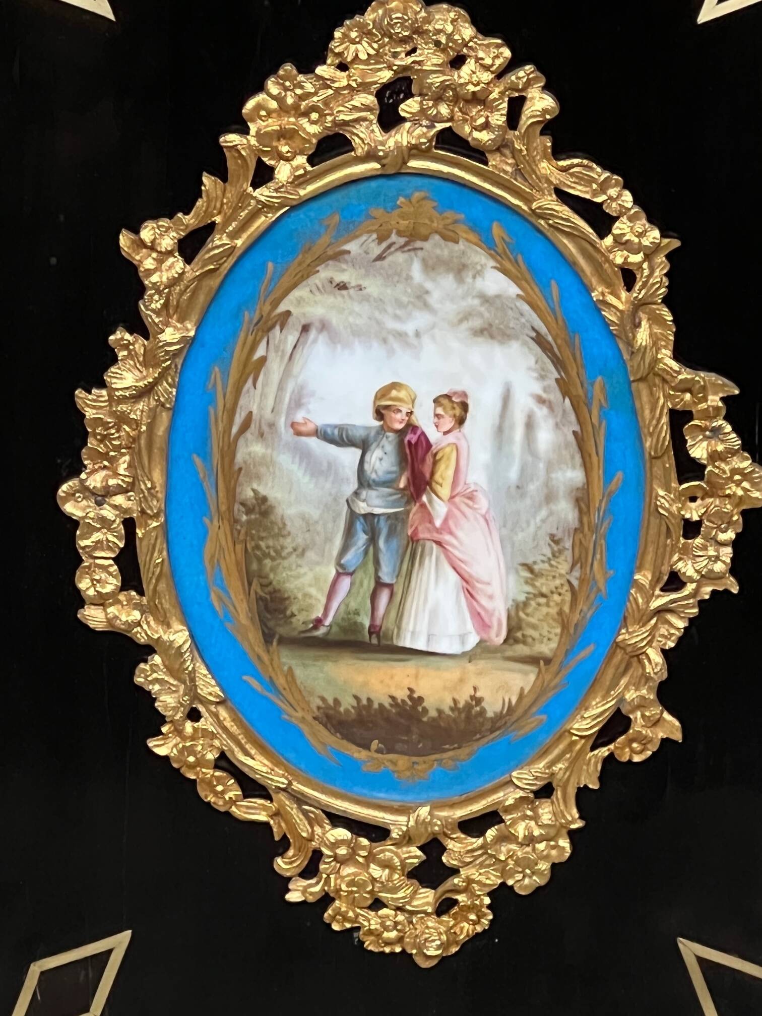 Napoleon III style credenza with four Sèvres medallions.