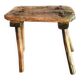 Old milking stool, old farm stool, primitive art.