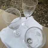 Set of 3 engraved champagne flutes.