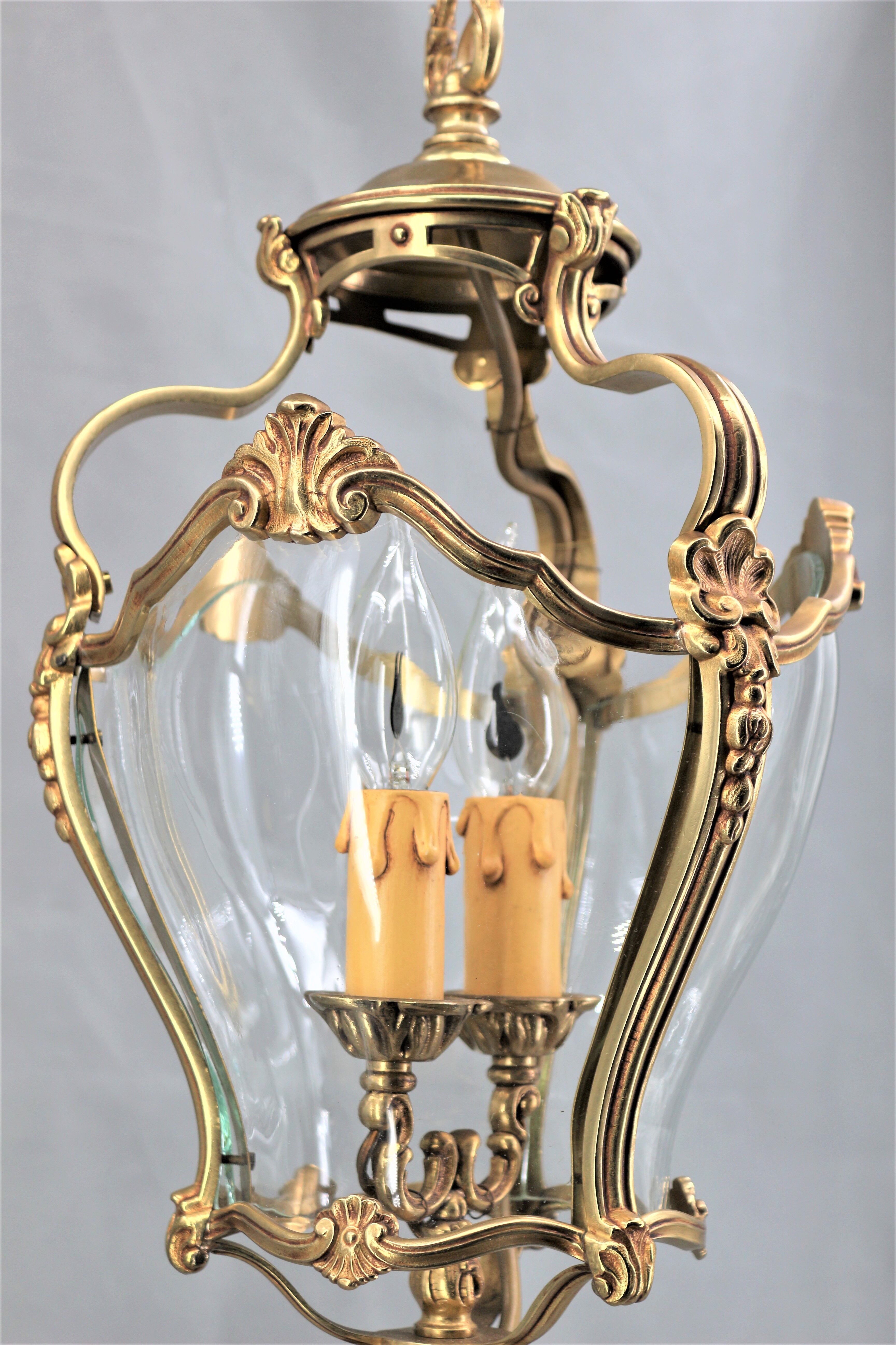 Lustre en bronze et verre bombé