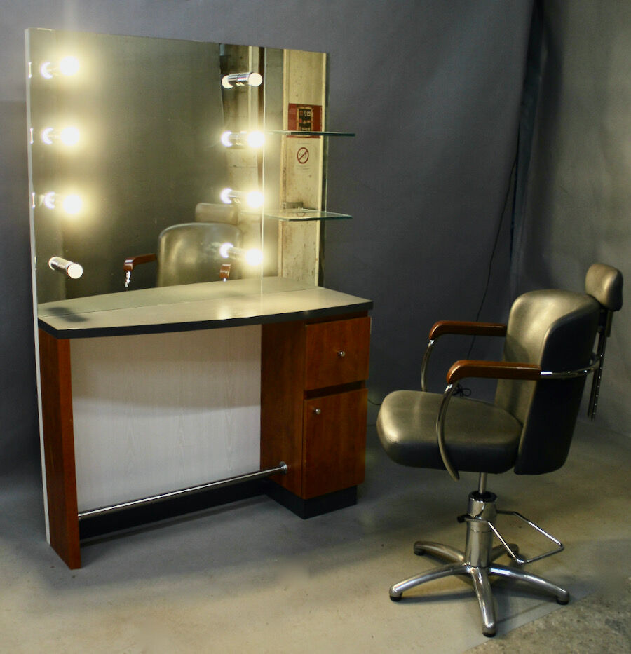 Spotlight hairdresser and her vintage barber chair