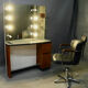 Spotlight hairdresser and her vintage barber chair