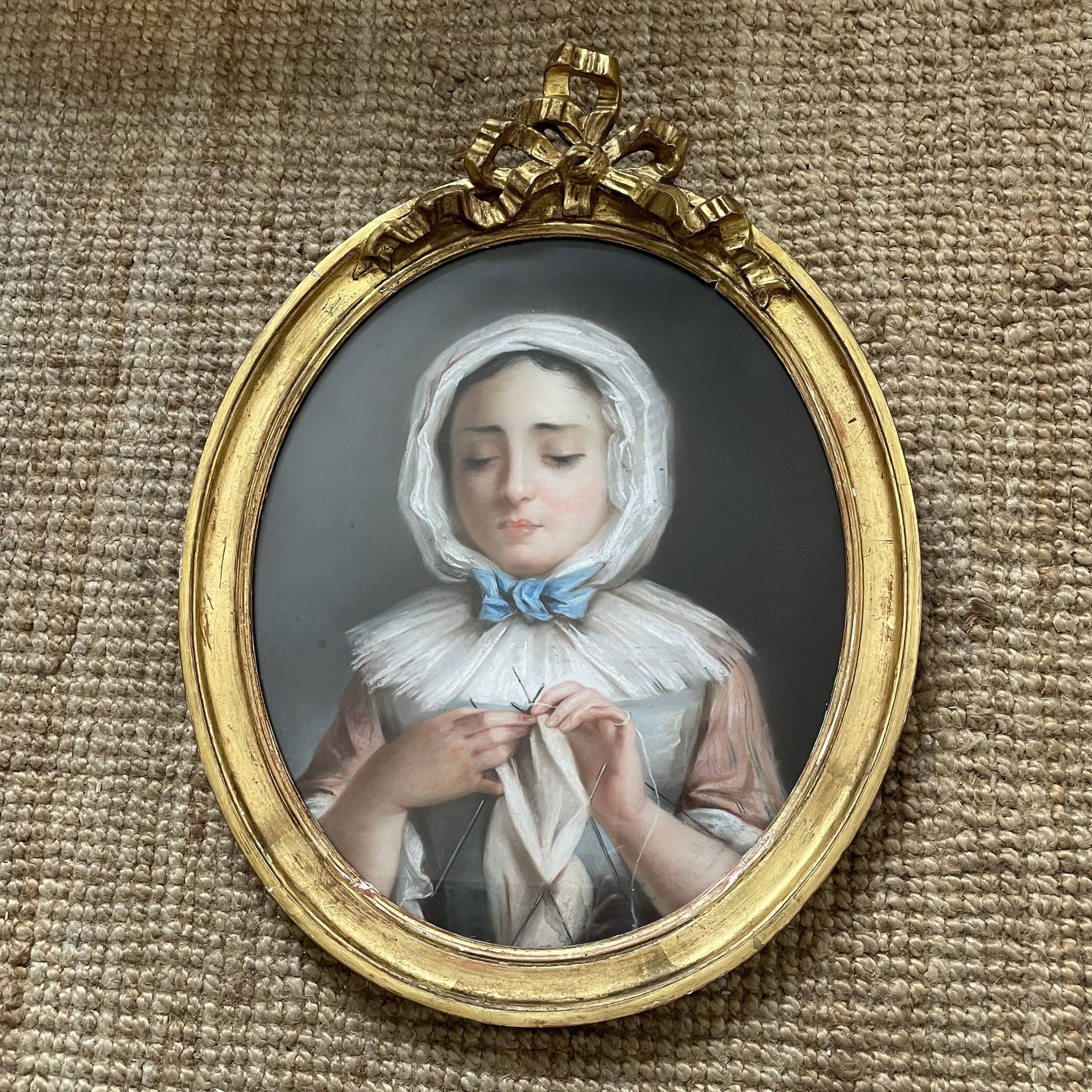 Portrait of a young girl in pastel from the 19th century.