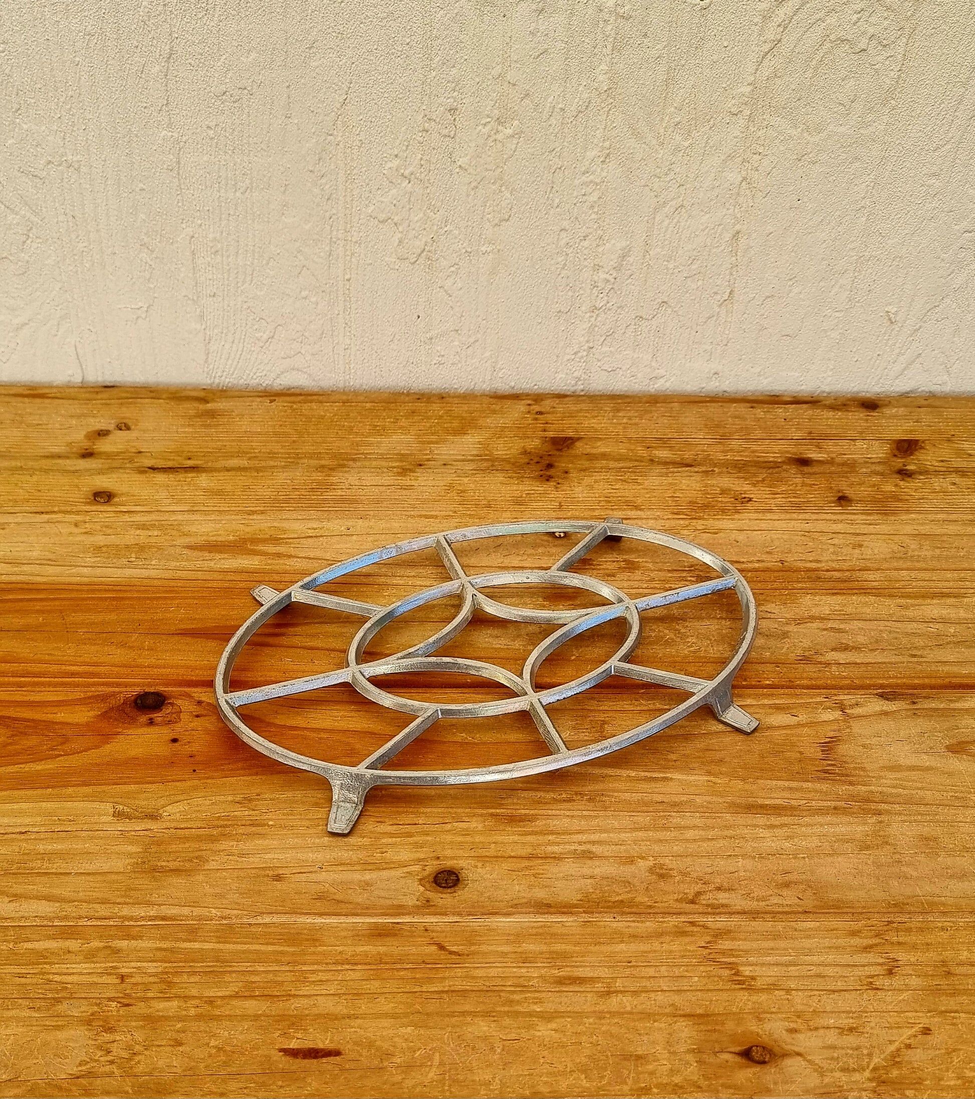 Vintage aluminium trivet