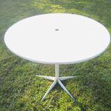 Table d'extérieur en fer piètement étoile du ancien bistrot pliable