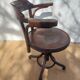 Swivel wooden armchair, pattern on seat