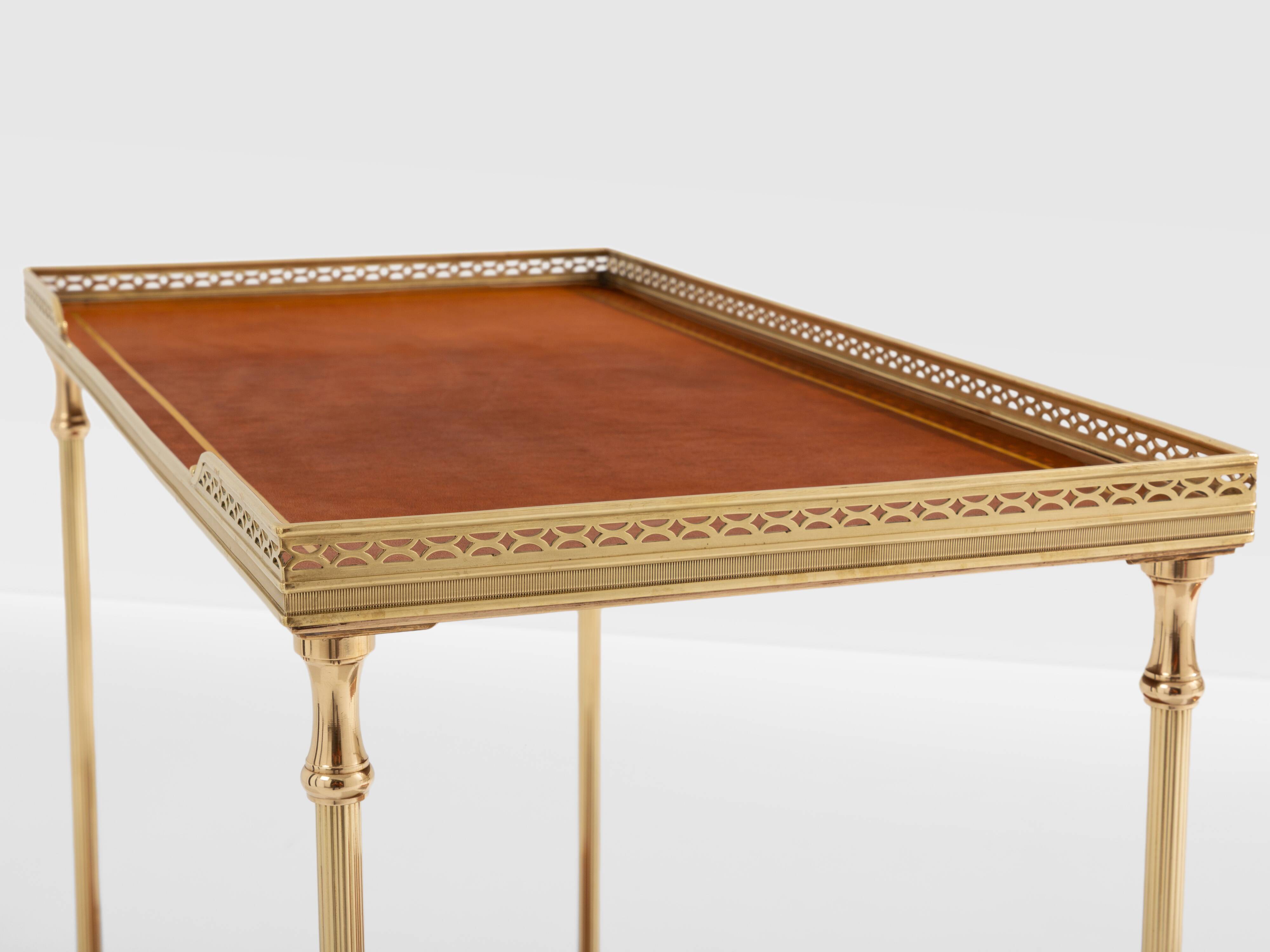 Pair of neoclassical brass and leather side tables by Maison Jansen, 1960