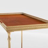Pair of neoclassical brass and leather side tables by Maison Jansen, 1960