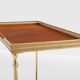 Pair of neoclassical brass and leather side tables by Maison Jansen, 1960