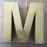 Golden vintage sign letter M
