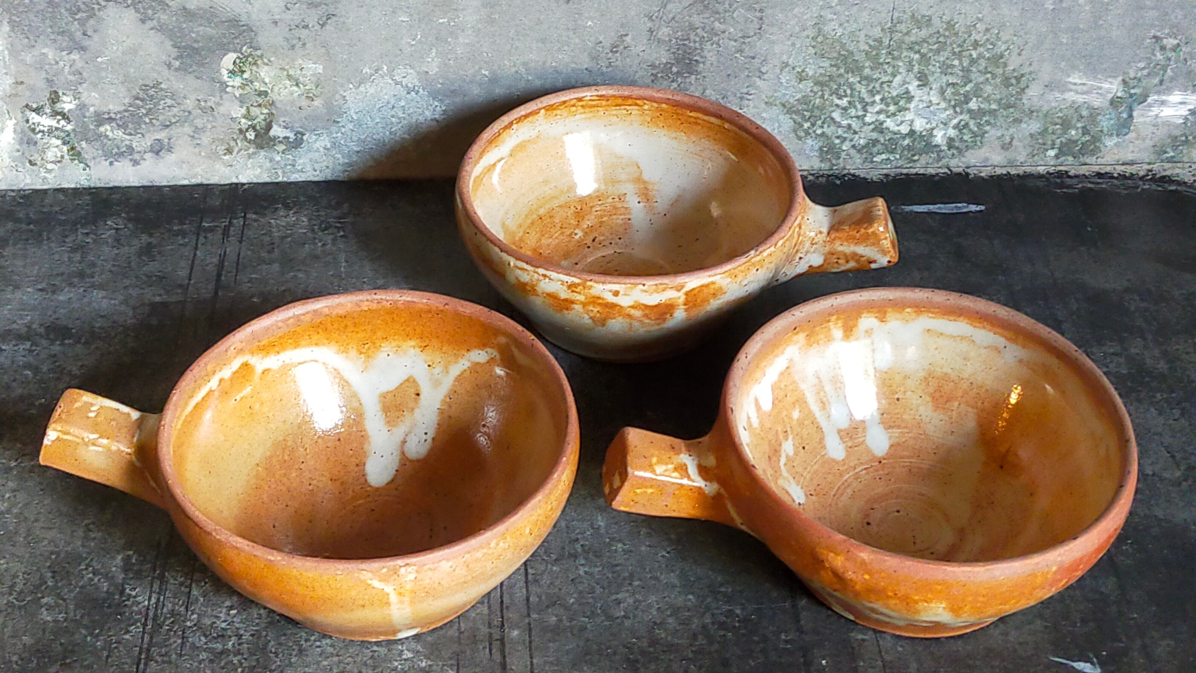 Three vintage marais sandstone bowls