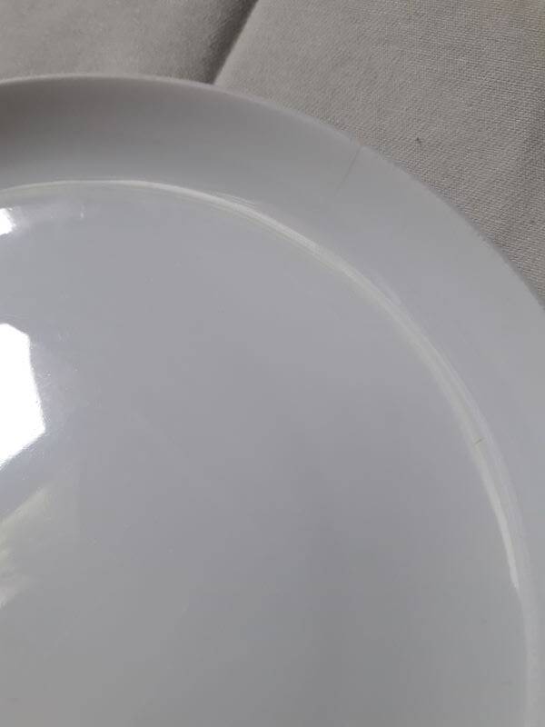 White porcelain drainer and dish