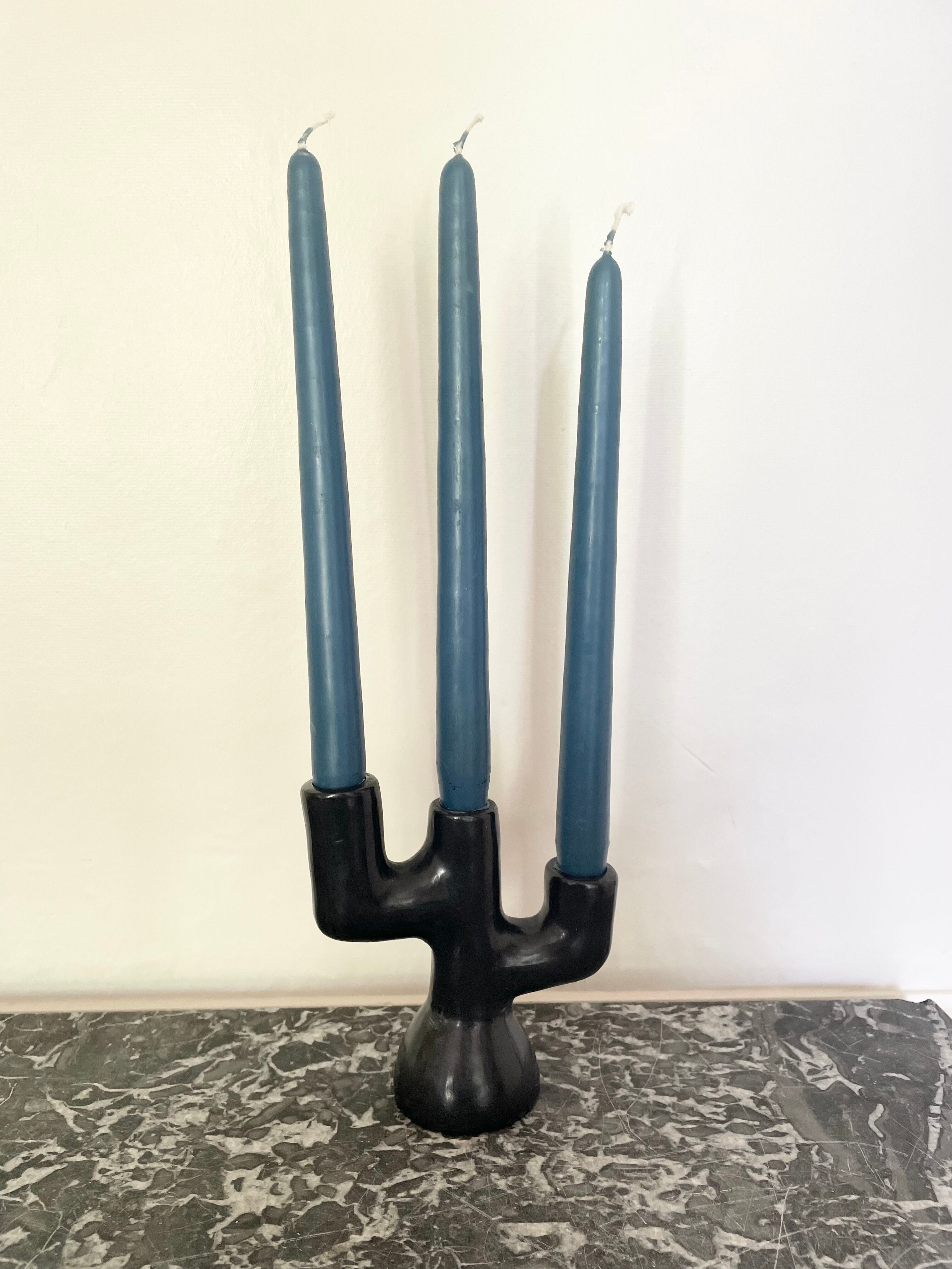 Black clay candle holder