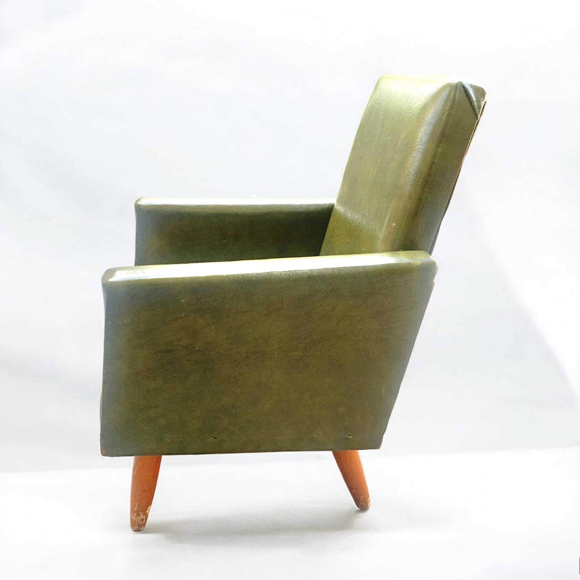 Vintage children's armchair in green skai