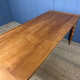 Antique cherry wood dining table from France.