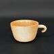 4 cups in glazed stoneware with graphic handles