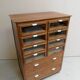Vitrine vintage avec tiroirs