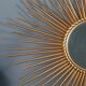 Miroir soleil Chaty à Vallauris métal doré 70 cm SB