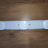 Vintage white plastic coat rack