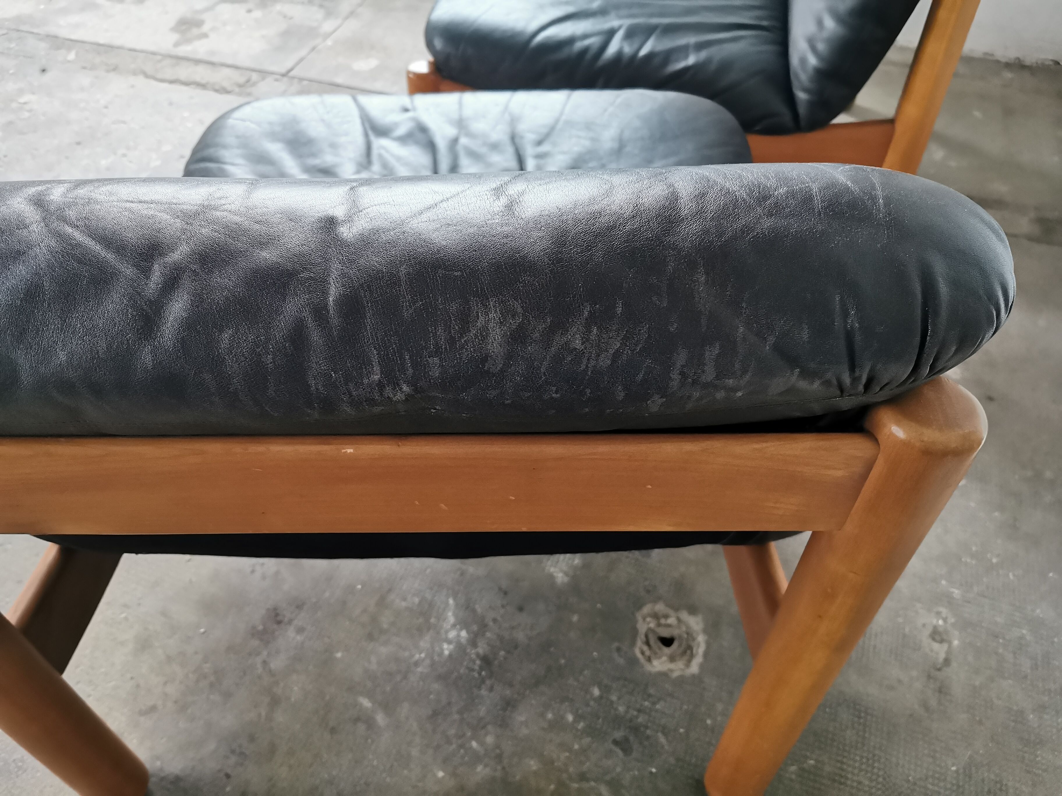 Pair of designer leather armchairs 80s
