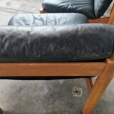 Pair of designer leather armchairs 80s