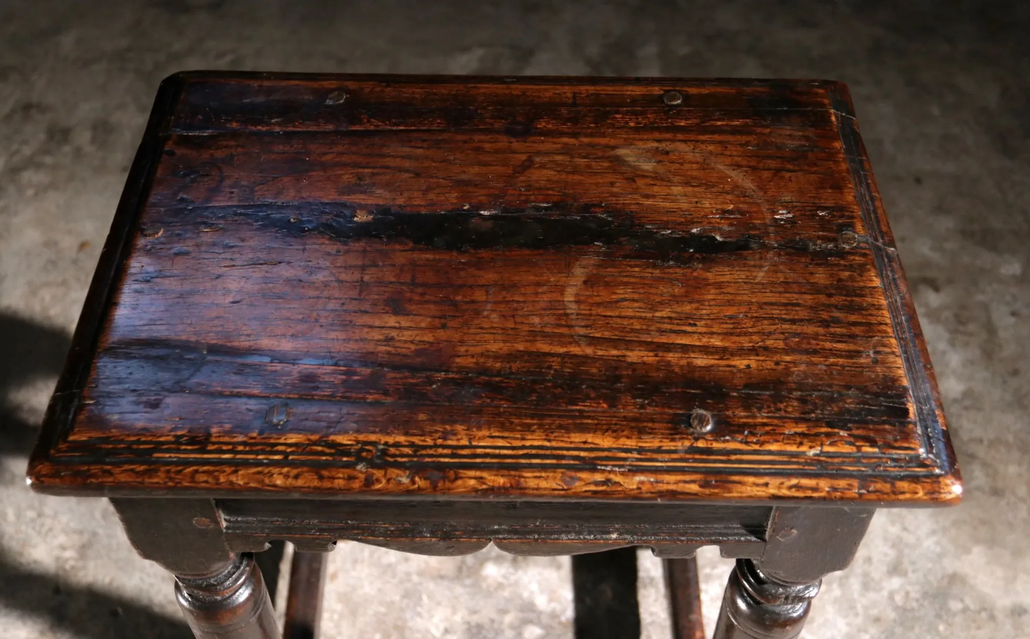17th-century English oak joint stool with turned legs