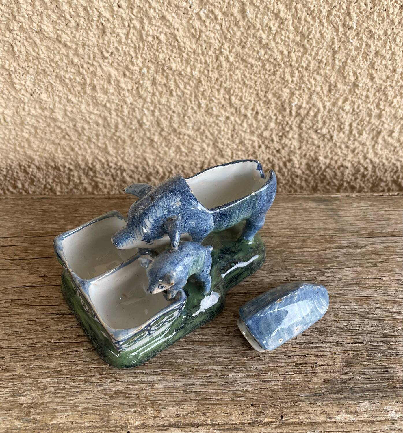 Salt cellar and mustard pot in French faience by A Clement.