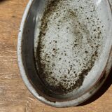 Petit plat ovale en céramique mouchetée glacée L23
