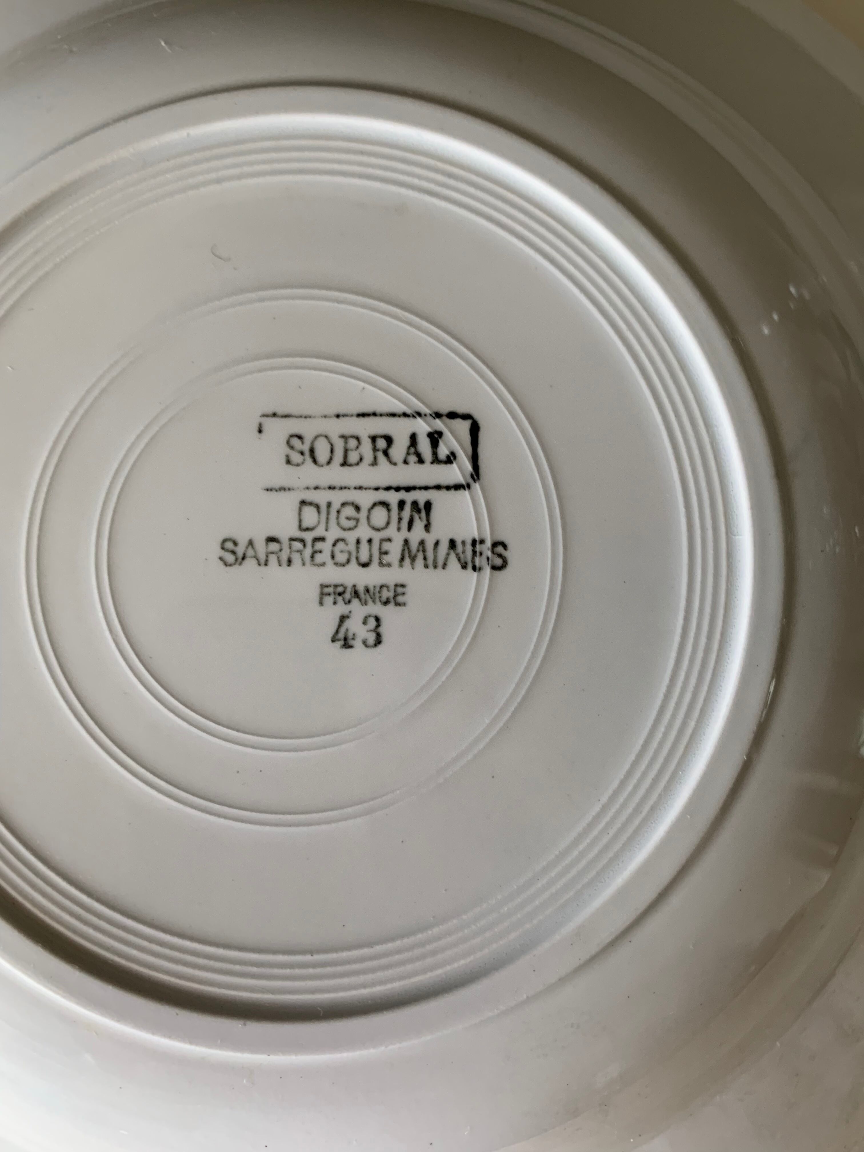 5 plates of Digoin earthenware