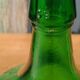 Superbe dame jeanne ancienne en verre vert