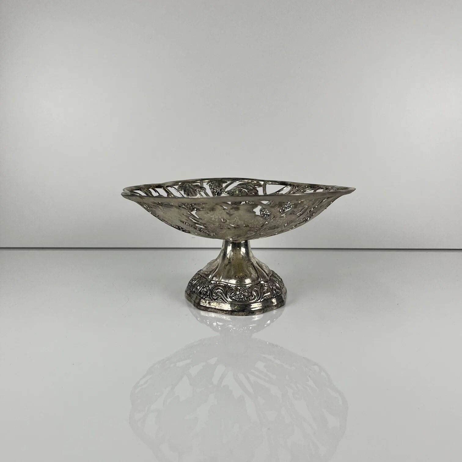 Openwork metal bowl with vine leaf and grape motif, 20th century