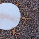 Golden metal sun mirror from the 1950s.