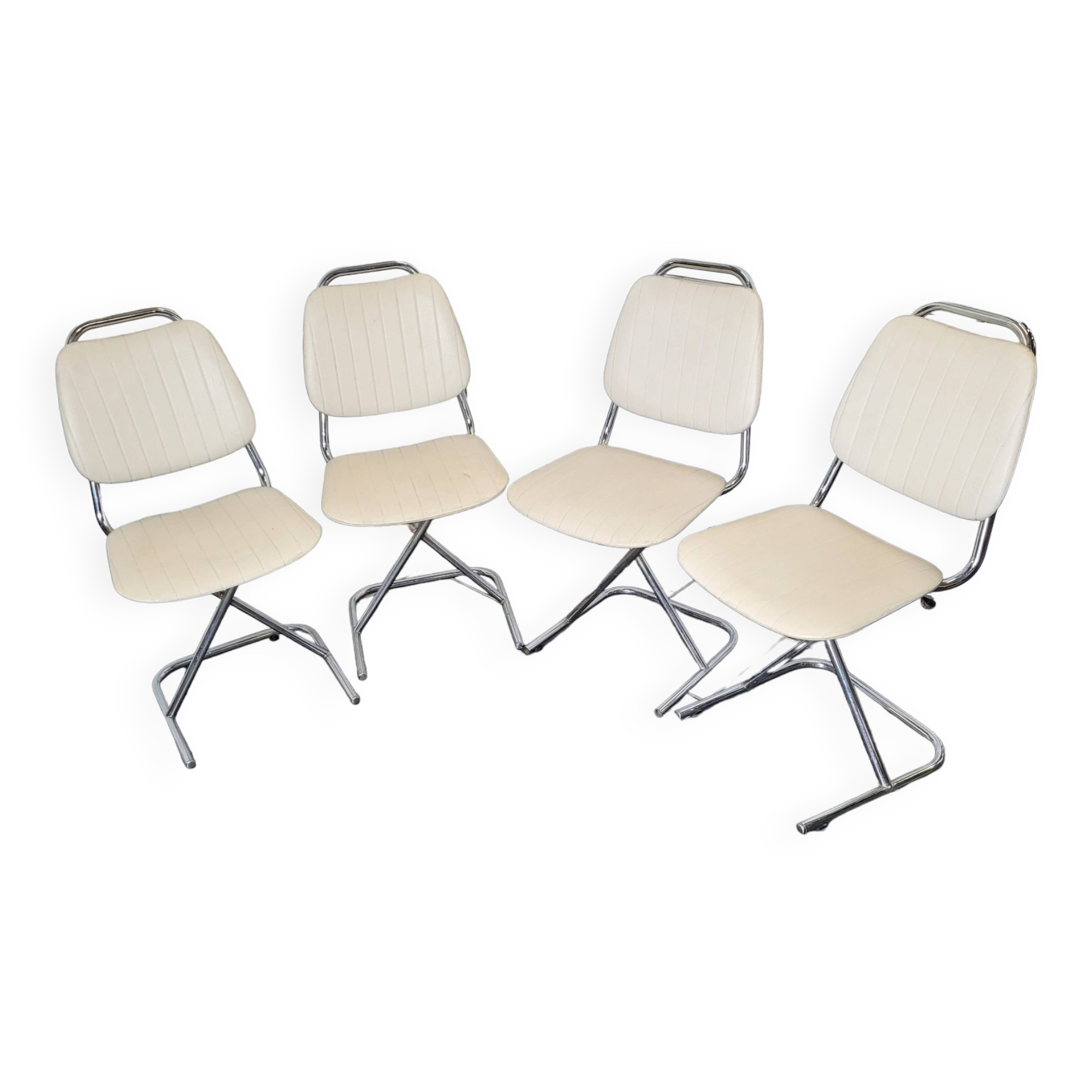 4 chrome foot chairs on top in Skaï from the 60s/70s