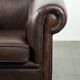 Luxury brown cow leather Chesterfield armchair with a timeless English look