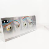 Pair of polished wall lamps by Gaetano Sciolari