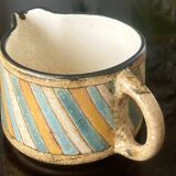 Antique milk jug.