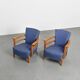 Pair of living room armchairs in solid beech, France, circa 1950.