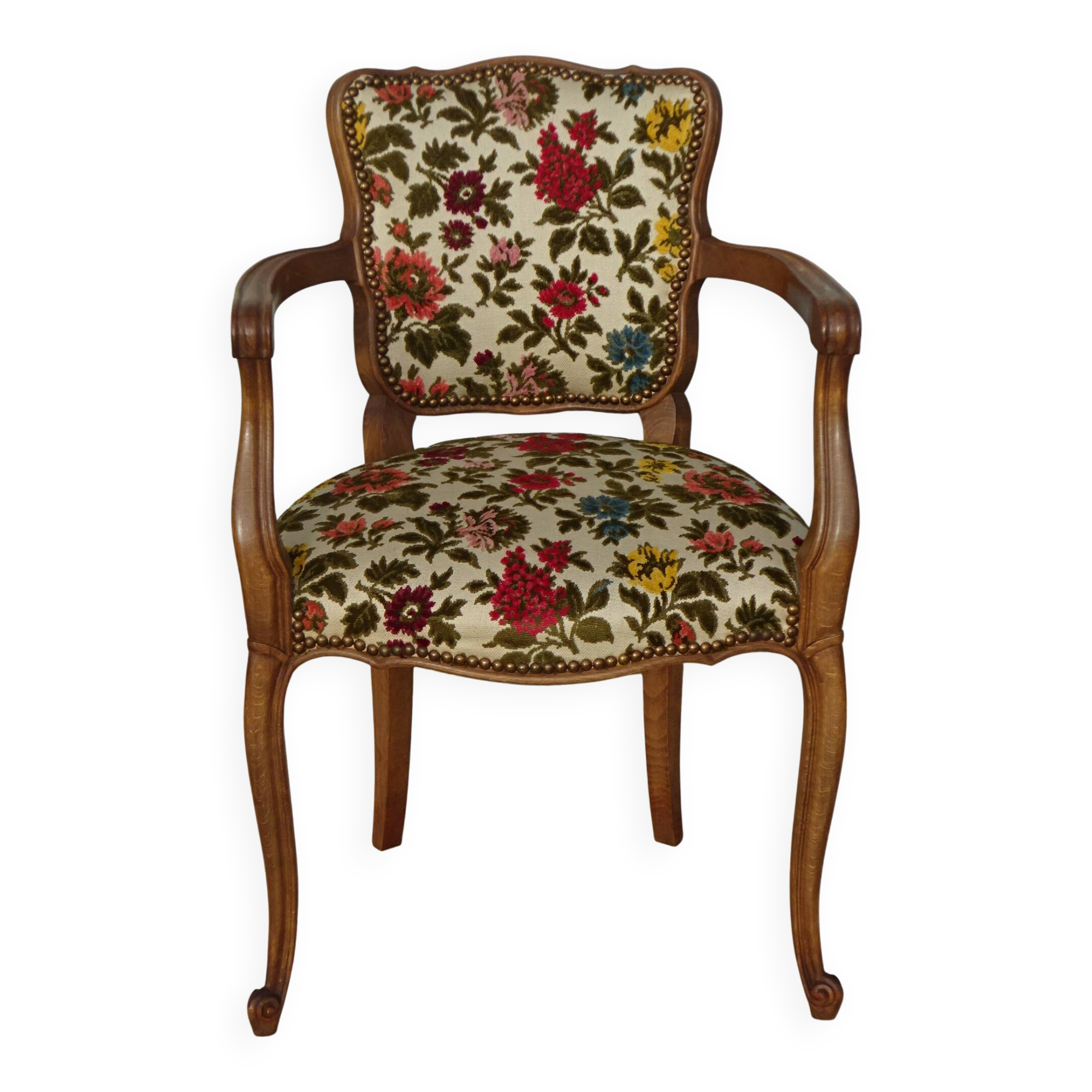 Convertible armchair with brocade fabric and floral patterns.