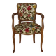 Convertible armchair with brocade fabric and floral patterns.