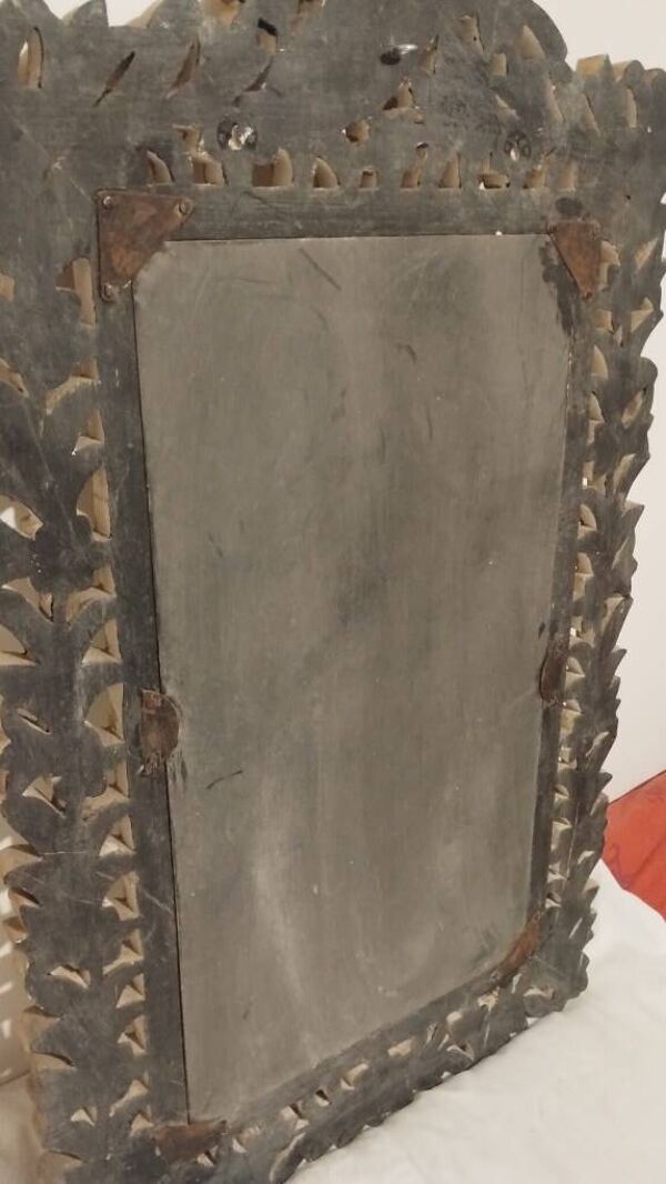 Miroir avec son cadre ajouré