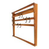 Mid-century Carl Auböck coat rack in beech with 7 brass hooks, 1950s.